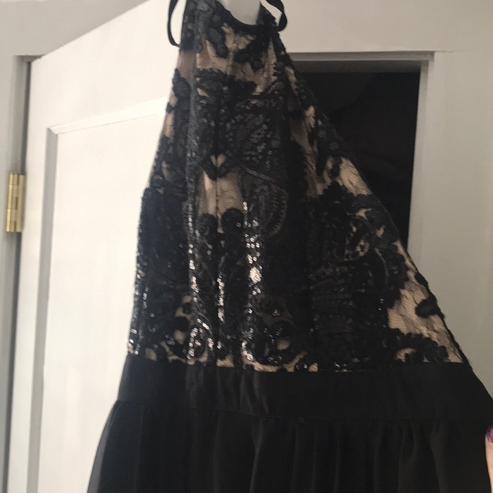 Black jumper with attacked skirt!